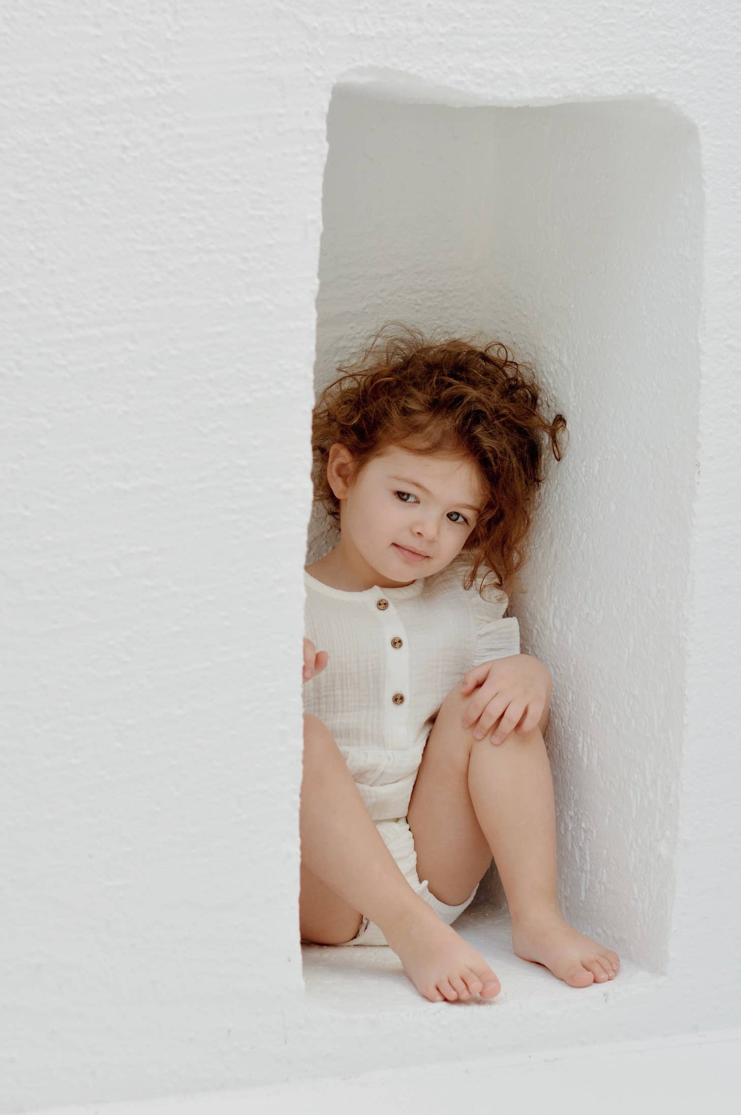White Ruffle Trim Muslin Bodysuit